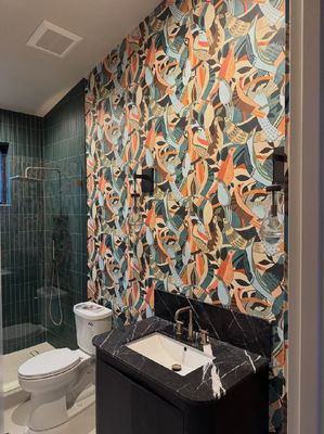 Colorful wallpapered bathroom feature wall